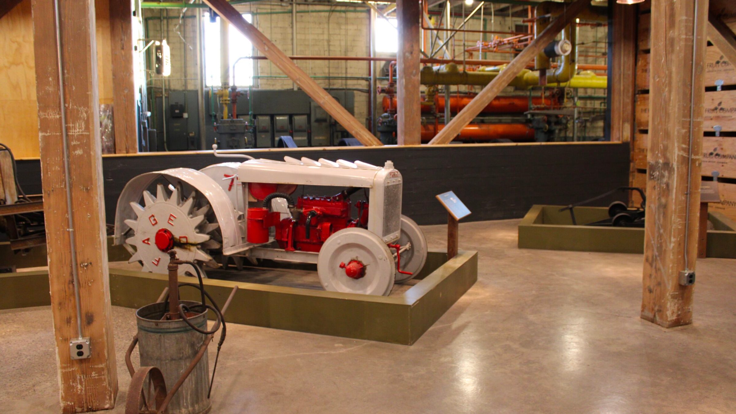 an antique tractor in a museum